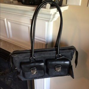 Dooney Bourke shoulder handbag. Black with leather trim